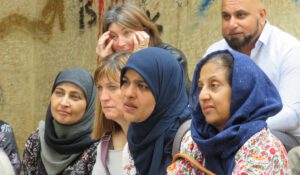 People listening to the tour