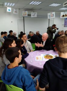 Man talking to high school kids