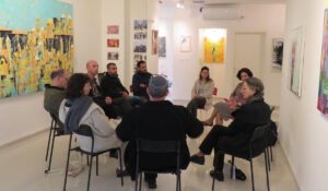 Group of teachers talking in a circle