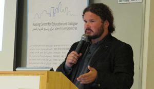 Man giving a lecture