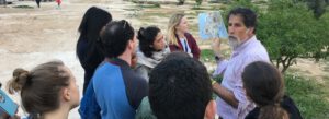 Man explaining to group about the landscape