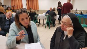 Two people looking over a paper