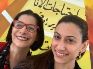 Two teachers smiling together