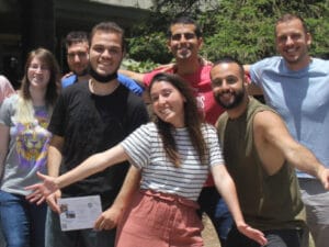 A group of students and their facilitators outside in the Givat Ram campus