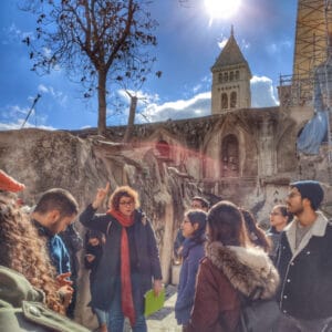 Hana teaching a group of young adults about the Ethiopian complex in the church of resurrection